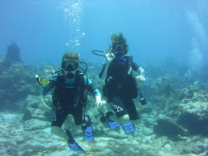 Young divers in the water at 25 feet