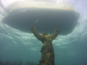 The statue of christ under the Island Ventures boat